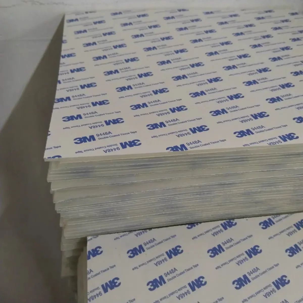 Stacked white silicone pads with 3M adhesive backing